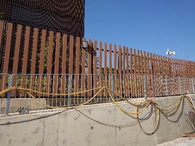 A picture containing fence, outdoor

Description automatically generated